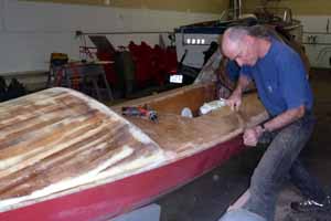 [Chris working on boat]