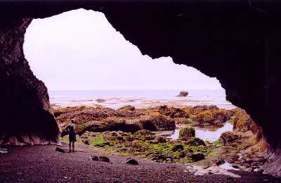 [Eric exploring cave]